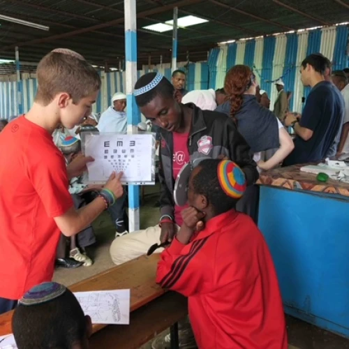 Volunteers test patients for short- and near-sightedness. Photo by Elisa Hartstein.