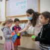 Children and teachers at the Gan Nayot kindergarten in Jerusalem on May 10, 2020. Photo by Yonatan SIndel/Flash90.