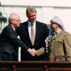Yitzhak Rabin, Bill Clinton, and Yasser Arafat at the signing of the Oslo Accords on Sept. 13, 1993. In an op-ed for JNS.org, Israeli Deputy Defense Minister Danny Danon wrote of renewed Israeli-Palestinian conflict negotiations, "Almost 20 years after Yitzhak Rabin attempted to conjure arch-terrorist Yasser Arafat into a worthy partner for peace, it seems that we have not learned the lessons from the past." Credit: Vince Musi/The White House.