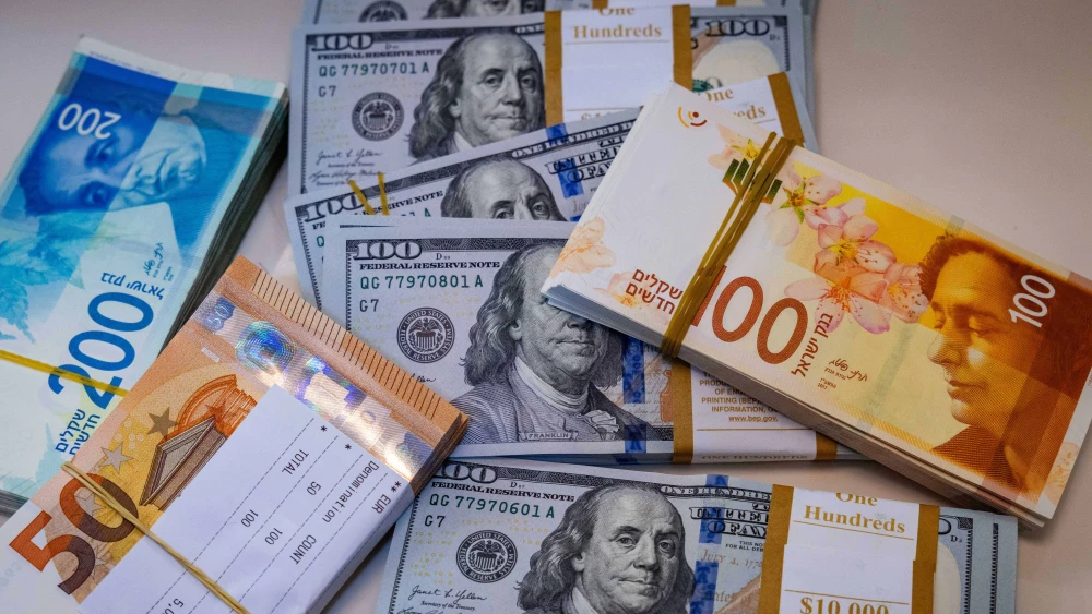 Illustration of American 100 dollar bills, 100 and 200 shekel bills and 50 euro bills, May 19, 2025. Photo by Nati Shohat/Flash90.