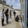 Jewish men work at the Homesh outpost in northern Samaria, May 29, 2023. Credit: Flash90.
