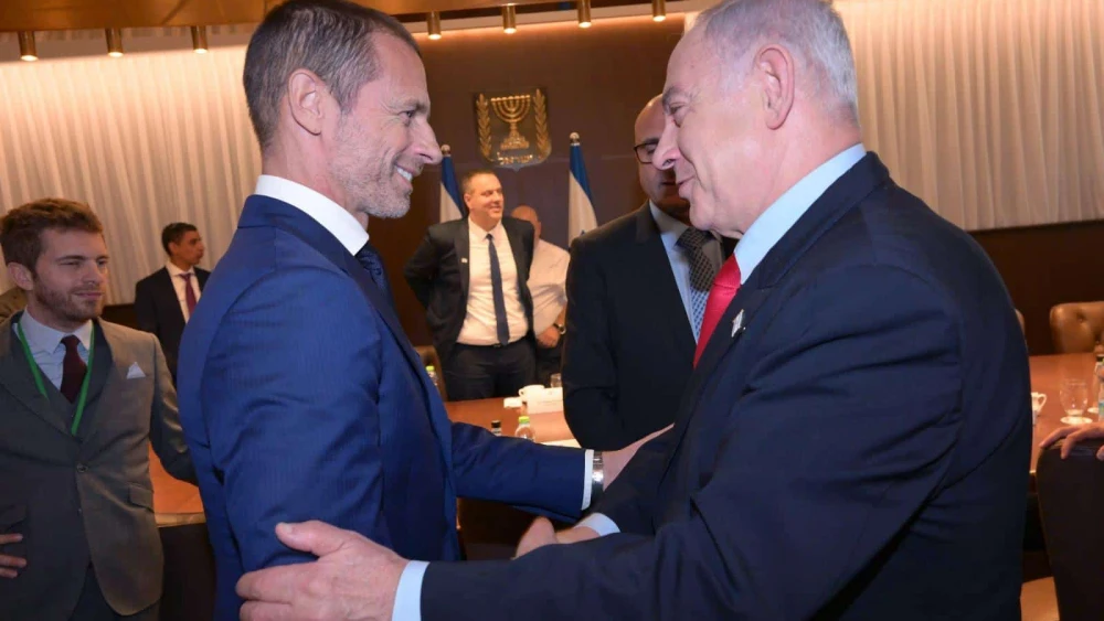 Israeli Prime Minister Benjamin Netanyahu meets in Jerusalem with UEFA President Aleksander Čeferin, Sept. 27, 2023. Photo by Amos Ben-Gershom/GPO.