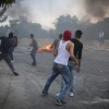 Israeli border police clash with Palestinians in the village of Khobar near Ramallah in the West Bank on July 27, 2018. Photo by Flash90.
