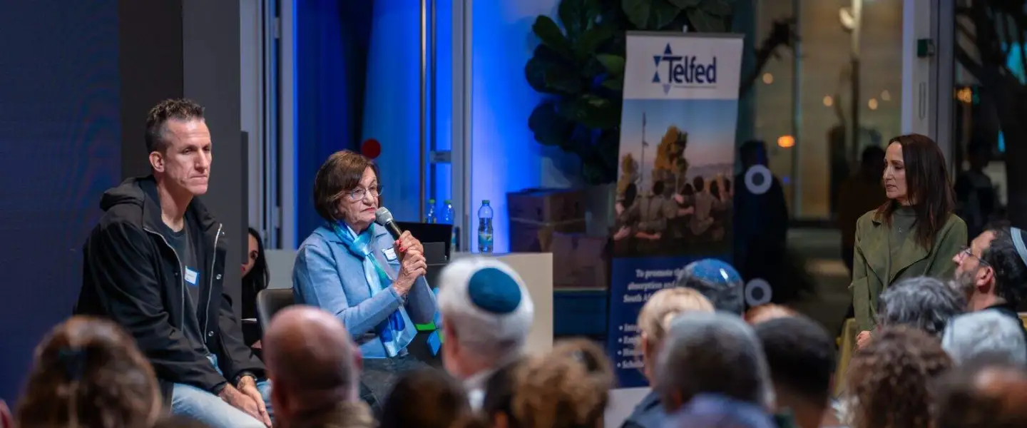 Dudu Baron and Carol Goldfus talk to Benita Levin about caring for wounded soldiers in the Israel Defense Forces at the Telfed event in Herzliya, Dec. 30, 2025. Photo by Brian Spector.