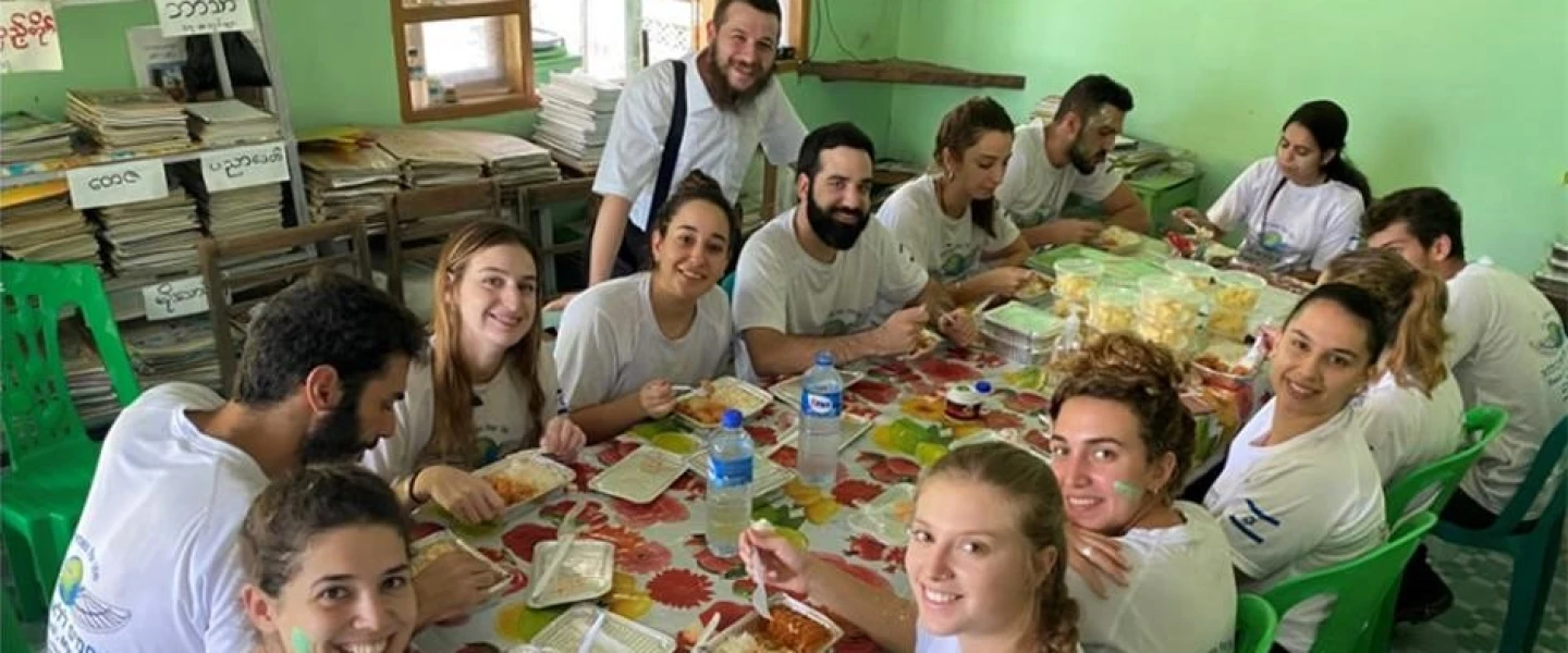 Rabbi Schneur Raitport hosts a group of visitors from Israel at the new Chabad center in Yangon, Myanmar. Credit: Chabad.org/News.