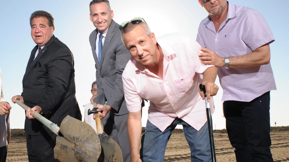 JNF CEO Russell Robinson, JNF Chief Israel Officer Eric Michaelson, Eshkol Regional Council Mayor Gadi Yarkoni, and JNF National Board Member Ron Werner lay the cornerstone for the new Halutza Community Center, providing a civic, cultural, and economic center for the entire Eshkol Region. Credit: Jewish National Fund.