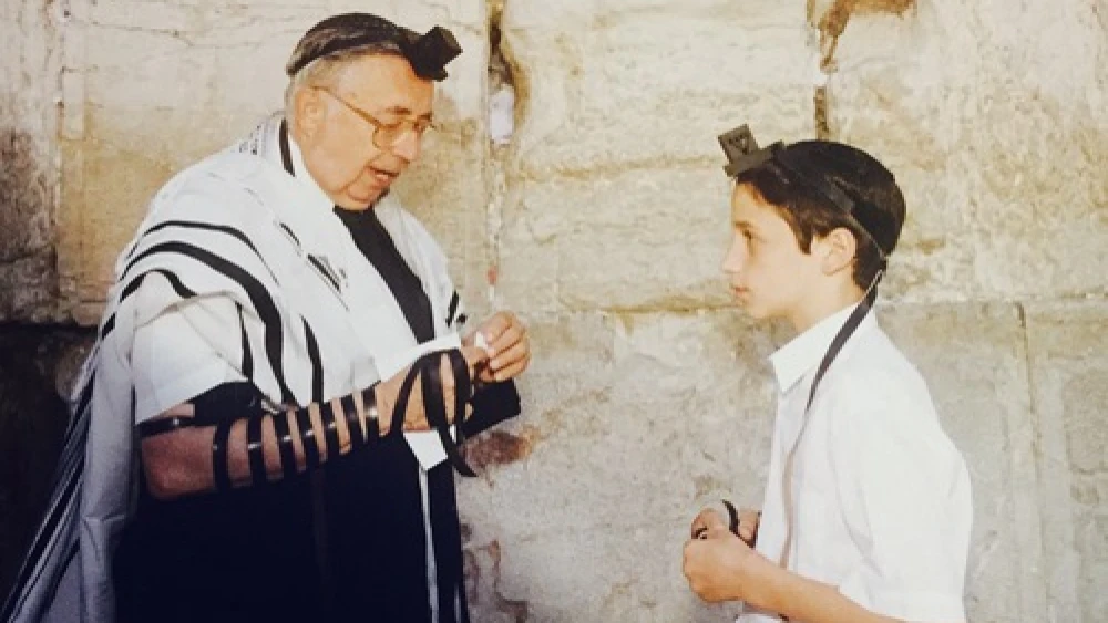 The "Jerusalem bar mitzvah king," Rabbi Jay Karzen (left), with a bar mitzvah boy at the Western Wall. Credit: Courtesy Rabbi Jay Karzen.