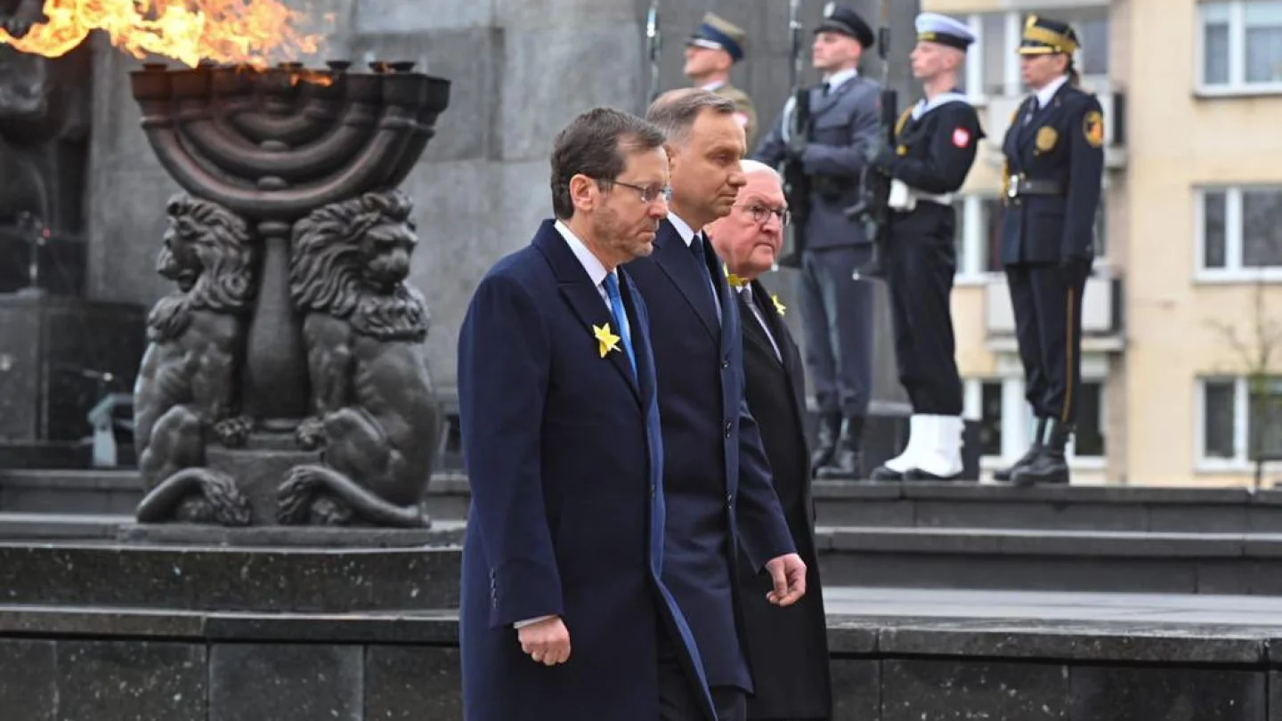From left: Israeli President Isaac Herzog, Polish President Andrzej Duda and German President Frank-Walter Steinmeier at the Monument to the Ghetto Heroes in Warsaw for a ceremony marking 80 years since the Warsaw Ghetto Uprising, on April 19, 2023. Photo by Kobi Gideon/GPO.