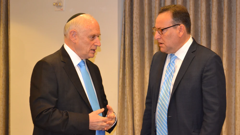 Malcolm Hoenlein (left), executive vice chairman of the Conference of Presidents of Major American Jewish Organizations, speaks with Kenneth L. Marcus, assistant secretary for civil rights at the U.S. Department of Education. Credit: Conference of Presidents of Major American Jewish Organizations.