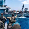 An Israeli Navy patrol boat crew trains alongside a missile ship during a branch-wide exercise in the Mediterranean and Red Seas, August 2026. Credit: IDF Spokesperson.