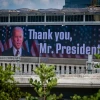 A large billboard thanking U.S. President Joe Biden for his support of Israel is displayed above the Ayalon Highway in Ramat Gan, Oct. 11, 2023. Photo by Avshalom Sassoni/Flash90.