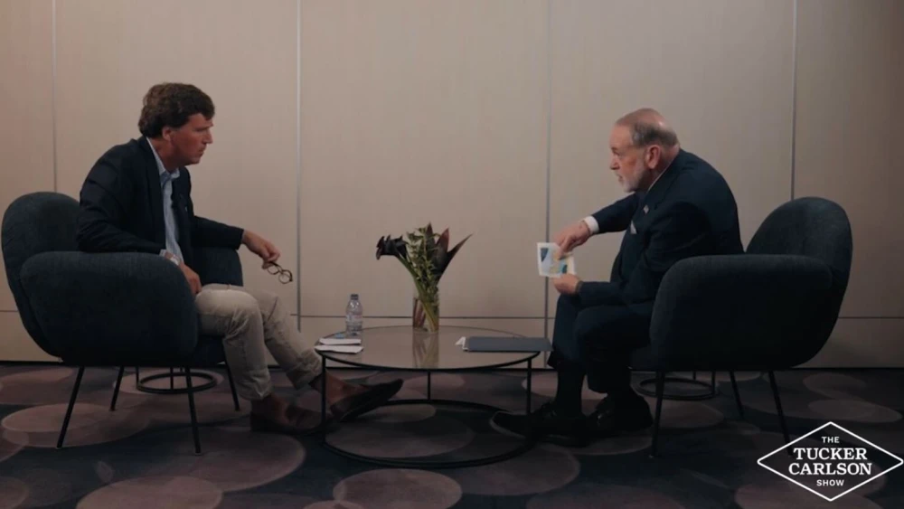 Political commentator and podcaster Tucker Carlson interviews U.S. Ambassador to Israel Mike Huckabee at Ben-Gurion International Airport, Feb. 18, 2026. Source: Tucker Carlson/YouTube.