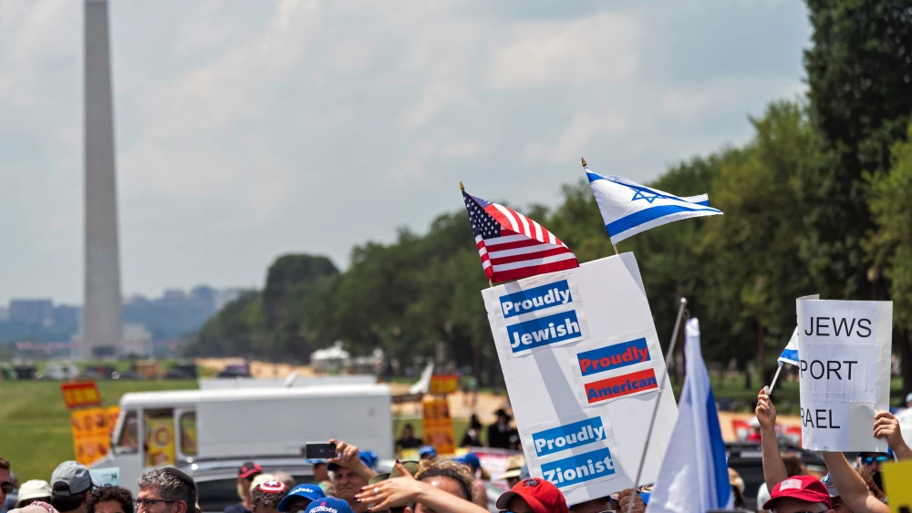 Signs at the “No Fear: A Rally in Solidarity With the Jewish People” on the National Mall in Washington, D.C., on July 11, 2021. Credit: Chris Kleponis.