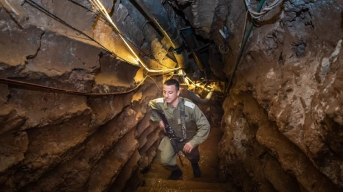 An Israeli soldier stands in a Hezbollah tunnel that crosses from Lebanon to Israel, on the border between Israel and Lebanon in northern Israel, on May 29, 2019. Photo by Basel Awidat/Flash90.