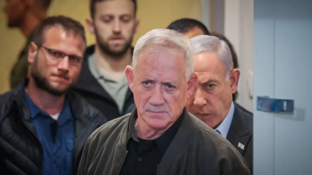 Israeli Minister Benny Gantz and Prime Minister Benjamin Netanyahu arrive at a press conference at the Defense Ministry in Tel Aviv, Dec. 16, 2023. Photo by Noam Revkin Fenton/Flash90.
