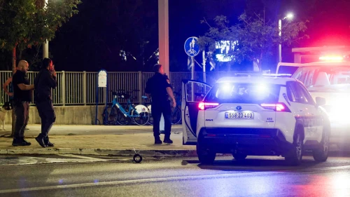 Israeli security forces at the scene where a fragment of a missile fired from Lebanon fell on a main road in Herzliya, Oct. 7, 2024. Photo by Tal Gal/Flash90.
