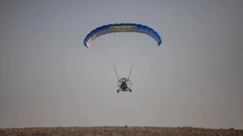 A paraglider flies near the Dead Sea in Israel, Aug. 2, 2019. Photo by Aharon Krohn/Flash90.