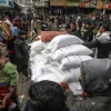 Palestinians receive food supplies at an UNRWA school in Rafah, the southern Gaza Strip, Jan. 28, 2024. Photo by Abed Rahim Khatib/Flash90.