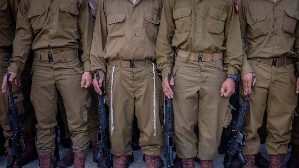 Israeli soldiers during a swearing-in ceremony at the Western Wall in Jerusalem's Old City, July 10, 2024. Photo by Chaim Goldberg/Flash90.