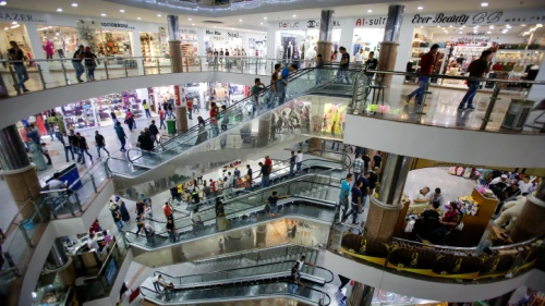 Palestinians shop at a mall in the West Bank city of Hebron on July 5, 2016. Photo by Wisam Hashlamoun/Flash90.