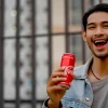 Man Drinking Coca-Cola