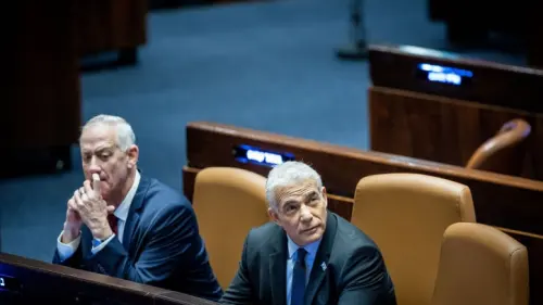 Then-Defense Minister Benny Gantz (left) and then-Prime Minister Yair Lapid during a vote at the Knesset in Jerusalem, Dec. 13, 2022. Photo by Yonatan Sindel/Flash90.