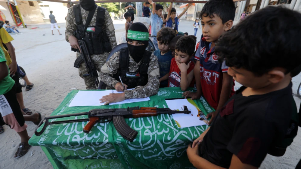 Hamas terrorists register Palestinian children for “Saif Al-Quds” camps in Rafah, in the southern Gaza Strip, on June 14, 2021. Photo by Abed Rahim Khatib/Flash90.