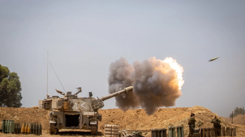 IDF Artillery Corps seen firing into the Gaza strip, near the Israeli border, following heavy rocket and missile barrages launched into Israel by Hamas and other terrorist organizations, May 12, 2021. Photo by Yonatan Sindel/Flash90.