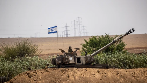 IDF Artillery Corps seen firing into Gaza near the Israeli border on May 20, 2021. Photo by Yonatan Sindel/Flash90.