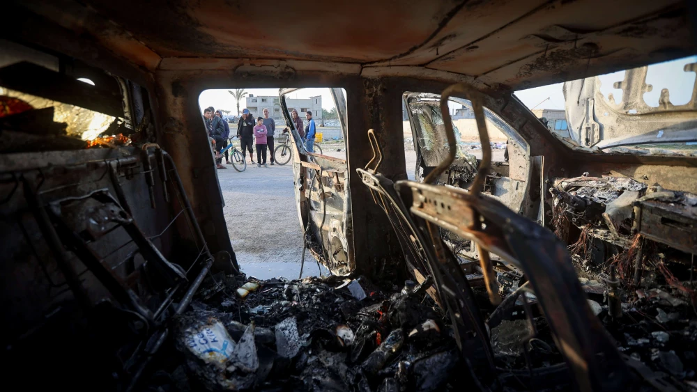 Palestinians inspect a World Central Kitchen vehicle that was hit by an Israeli airstrike in the Gaza Strip on April 2, 2024. Photo by Atia Mohammed/Flash90.