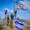 Israeli soldiers Israeli flag Kibbutz Nir Am