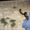 Blowing a shofar at the Western Wall in the Old City of Jerusalem, Sept. 16, 2017. Photo by Yonatan Sindel/Flash90.