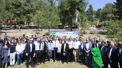 Diplomats stationed in Israel participate in a Keren Kayemet LeYisrael-Jewish National Fund tree planting event in the Jerusalem Forest, May 3, 2023. Photo by Yossi Zamir/KKL-JNF.