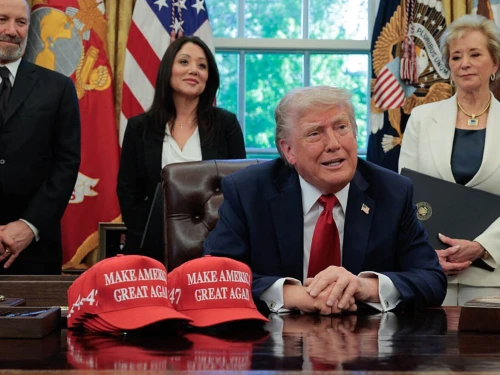 U.S. President Donald Trump speaks to reporters after signing executive orders in the Oval Office at the White House, including one obligating universities to disclose foreign gifts, on April 23, 2025. Photo by Chip Somodevilla/Getty Images.