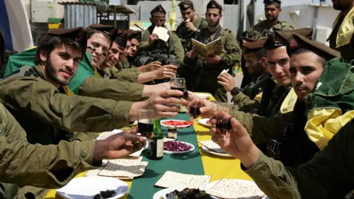 Israeli soldiers of the Golani Brigade eat a Passover meal. Credit: Edi Israel/Flash90.