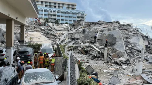 Search and rescue workers comb through the rubble of the Champlain Towers South condominium. Source: Miami-Dade Fire Rescue/Twitter.