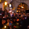 Click photo to download. Caption: Eastern Orthodox Christian nuns hold candles and flowers as they walk along the Via Dolorosa in the Old City of Jerusalem on Aug. 25, 2015. Credit: Micah Bond/Flash90.