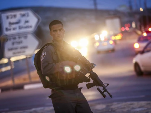 An Israel Defense Forces soldier in the South Hebron Hills, April 2, 2015. Photo by Nati Shohat/Flash90.