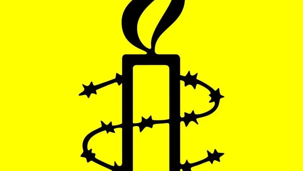 The logo of Amnesty International. Source: Facebook.