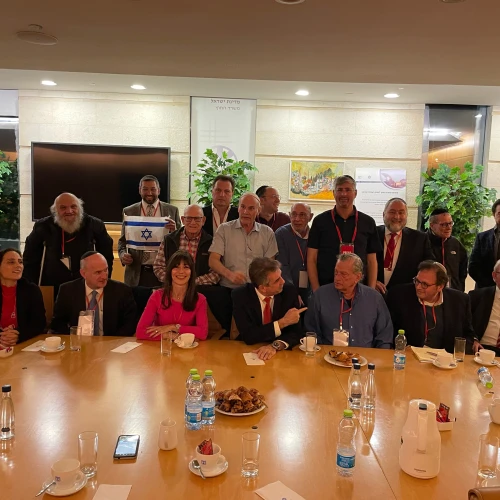 Israeli Foreign Minister Eli Cohen (seated, center) meets with a delegation of Likud Anglos at the Foreign Ministry in Jerusalem, Feb. 23, 2023. Credit: Judith Segaloff.