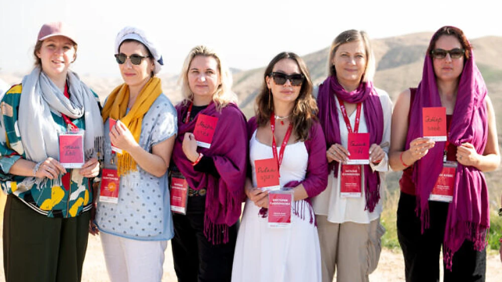 Women from the group pose with their newly selected ‘Jewish name’ on top of Masada in southern Israel. Photo by Aviram Valdman/Momentum.