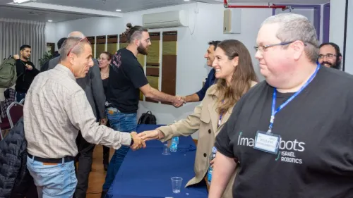 Panelists greet audience members at "The Real Step-by-Step Journey of a Start-Up" conference at the Braude College of Engineering, Karmiel, Jan. 9, 2023. Courtesy photo.