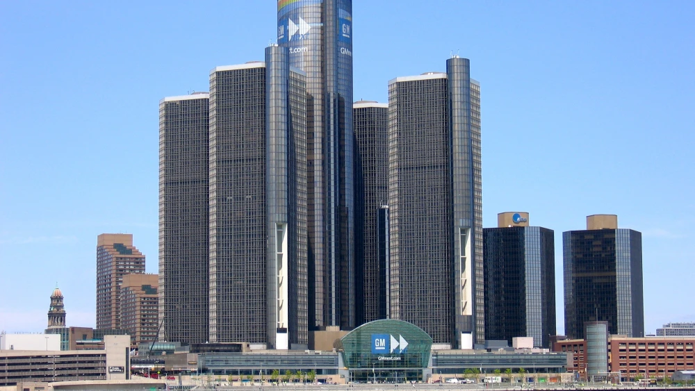 General Motors headquarters in Detroit, taken from Windsor on the Canadian side of the Detroit River. Credit: Ritcheypro via Wikimedia Commons.