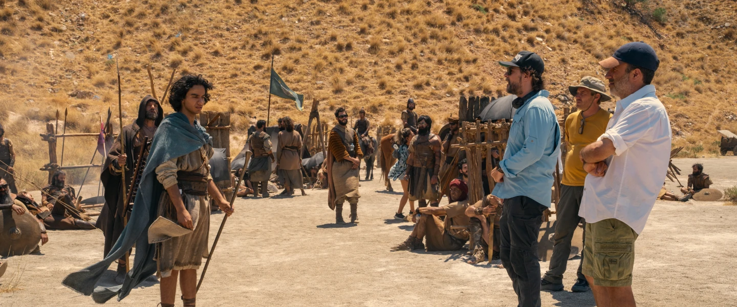 Film director Jon Gunn (at right in blue long-sleeved shirt) on the set with actor Michael Iskander, who plays the biblical character David in the U.S. historical drama television series “House of David.” Credit: Jonathan Prime/Prime © Amazon Content Services LLC.