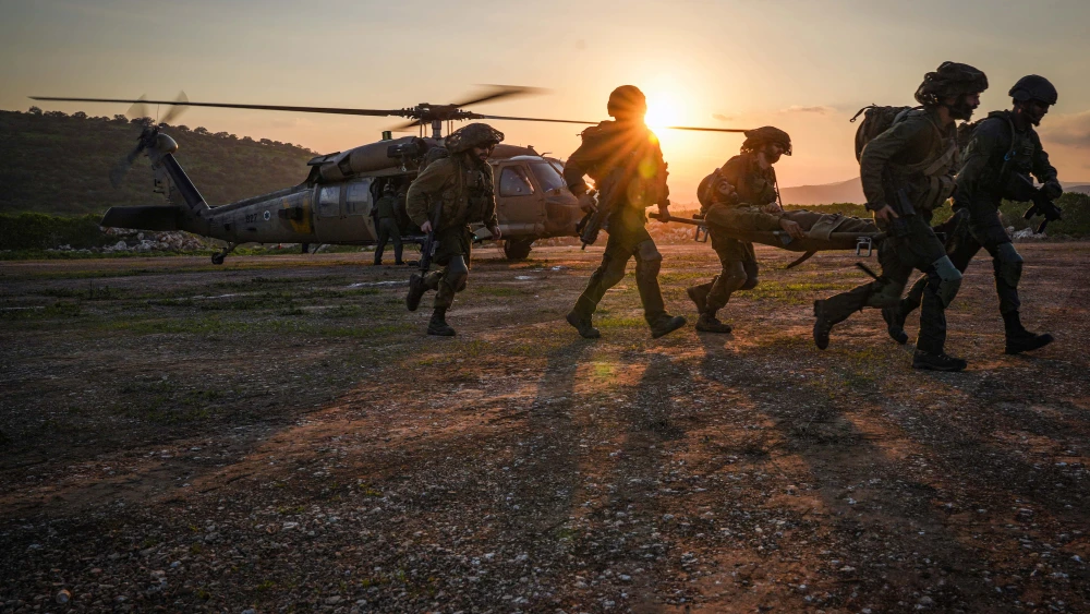 Israeli soldiers drill the evacuation of wounded comrades via helicopter in the Golan Heights, Feb. 7, 2024. Photo by Ayal Margolin/Flash90.