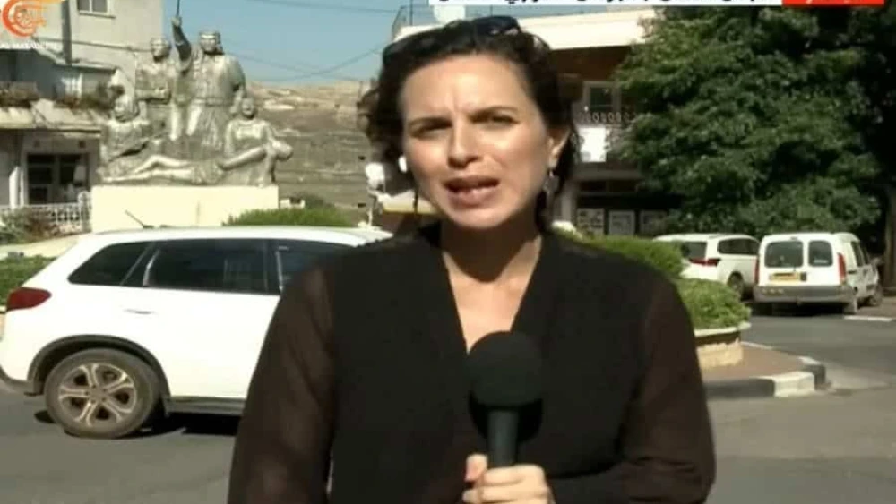 "Al Mayadeen" reporter Hanaa Mahamid broadcasts live from Majdal Shams in the Golan Heights, where a rocket fired by Lebanese Hezbollah killed 12 children, July 28, 2024. Source: Screenshot/X.