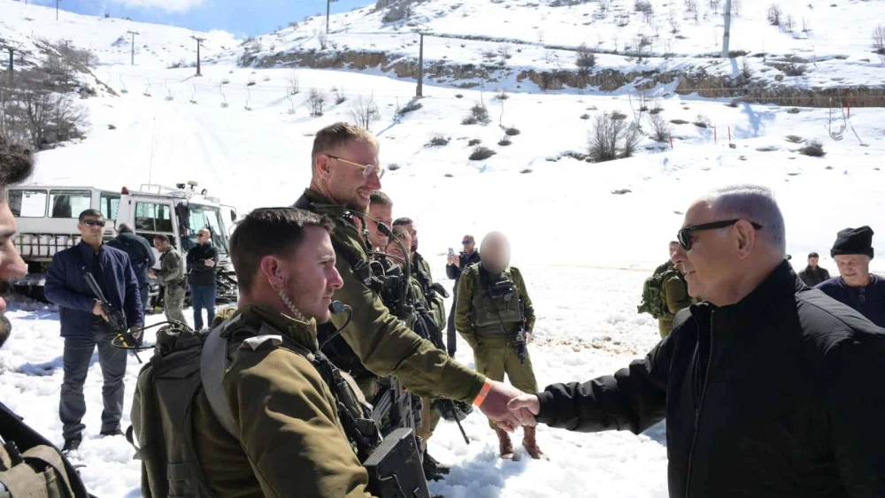 Israeli Prime Minister Benjamin Netanyahu visiting soldiers stationed on Mount Hermon, Feb. 22. 2024. Photo by Amos Ben-Gershon/GPO.