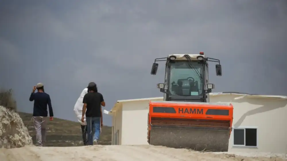 Jewish men work in Homesh, Samaria, on May 29, 2023. Photo by Flash90.
