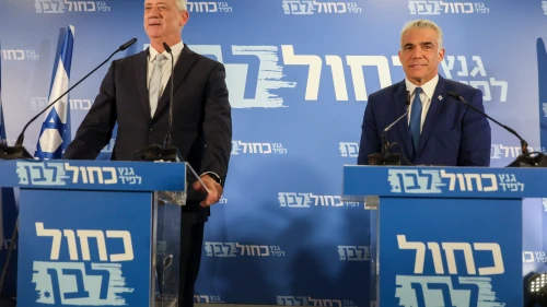 Benny Gantz and Yair Lapid of the Blue and White party give a joint a statement in Tel Aviv on Feb. 21, 2019. Credit: Noam Revkin Fenton/Flash90.
