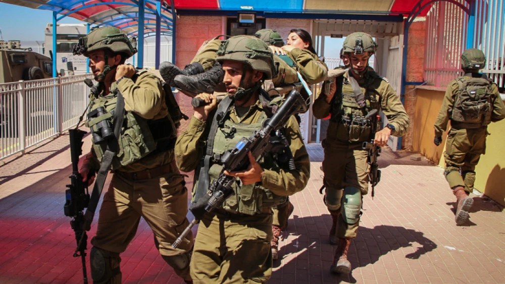 Israeli soldiers participate in a drill simulating a terrorist infiltration into a school in Gush Etzion, Aug. 19, 2020. Photo by Gershon Elinson/Flash90.